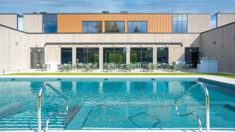 Outdoor pool and dining area