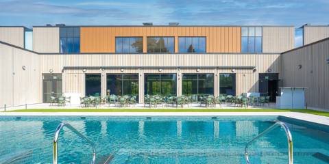 Outdoor pool and dining area