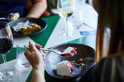 Lady eating a dessert