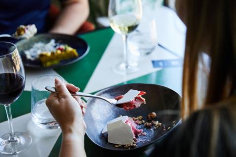 Lady eating a dessert