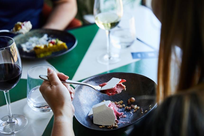 Lady eating a dessert