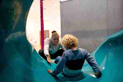 Mum and child on slide