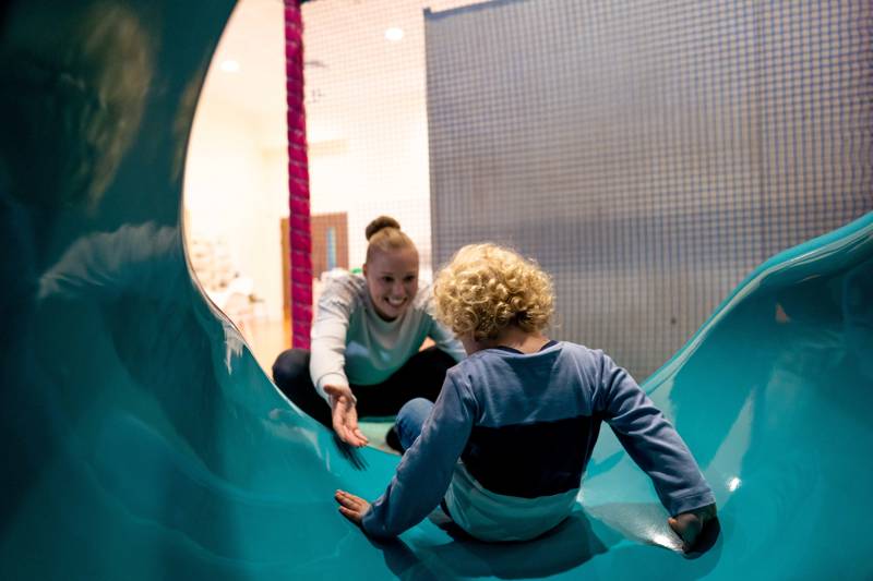 Mum and child on slide