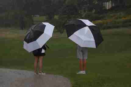 Golfers In The Rain (1)