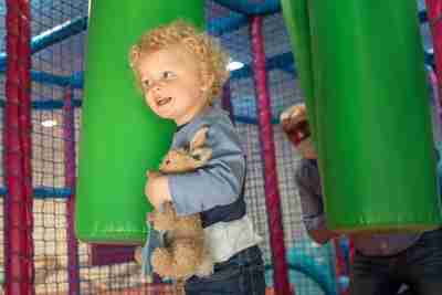 Baby in soft play area